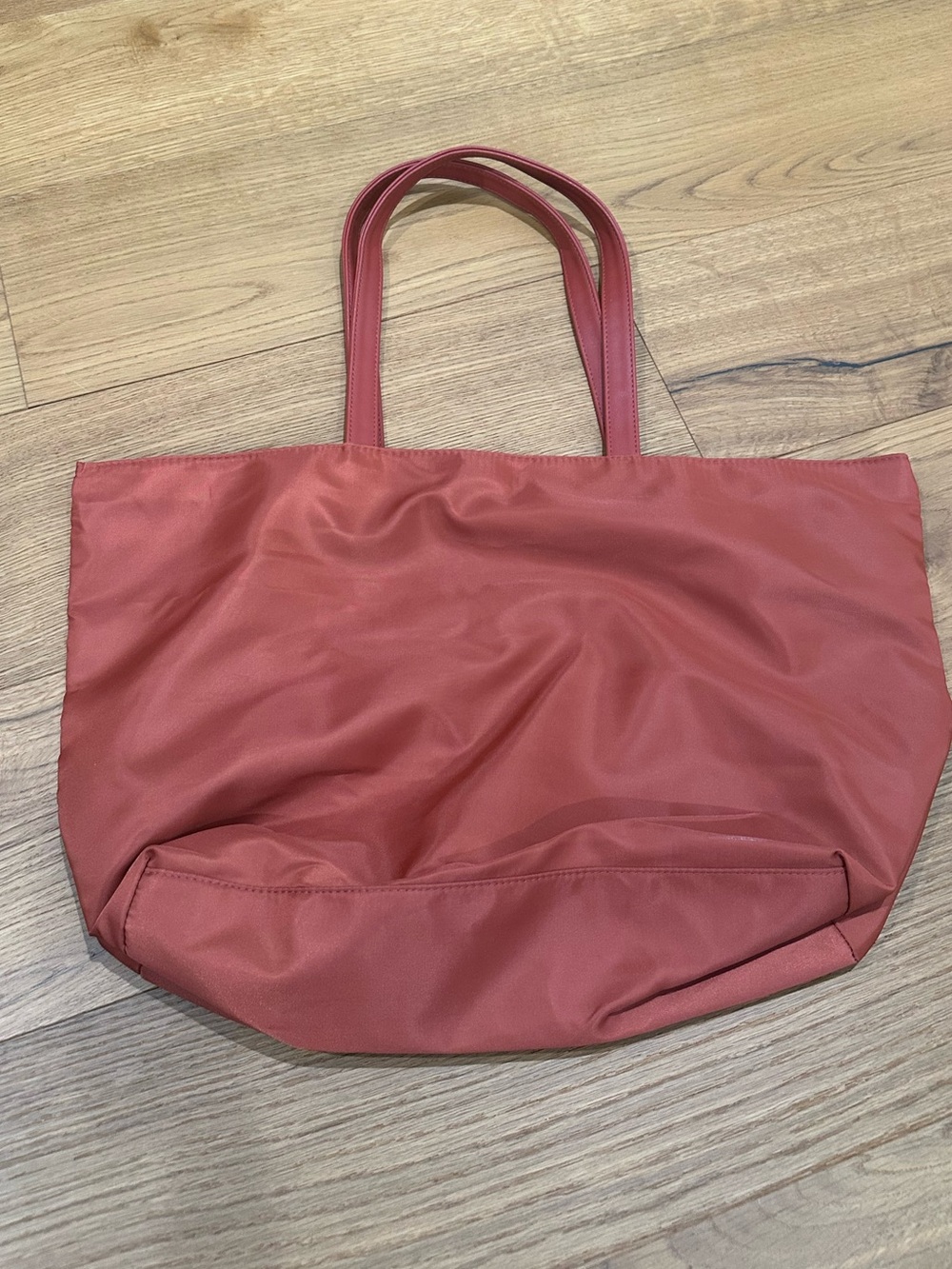 Orange bag with zipper. Like new.